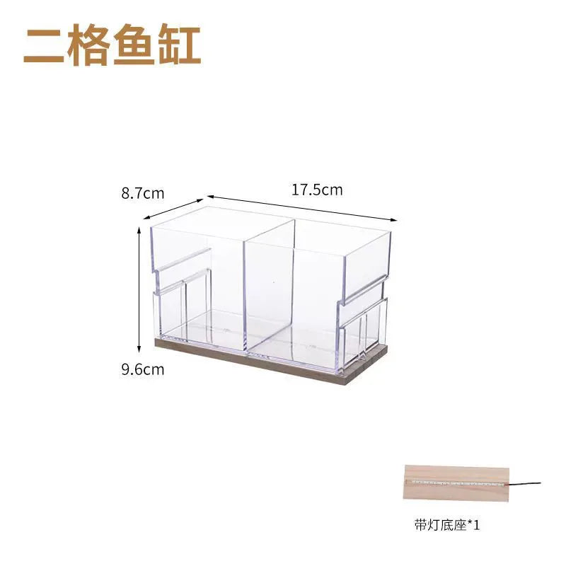 A small barrel-shaped fish tank with a built-in lighting system, a tabletop miniature landscape, and a mini aquarium s